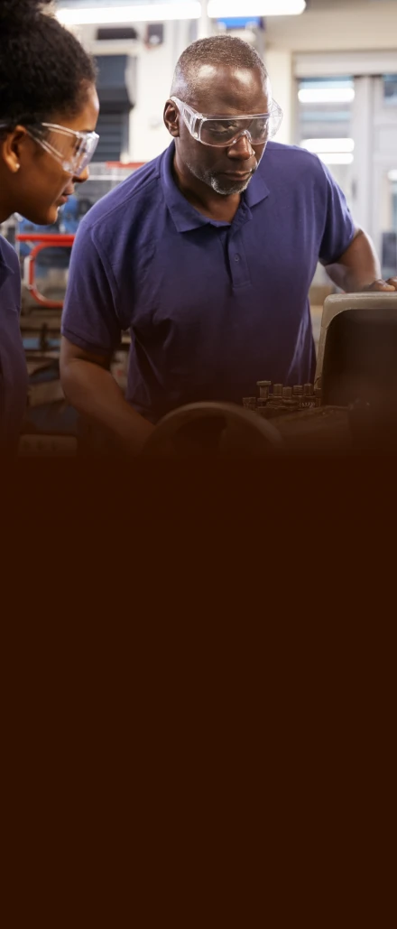 Workers collaborating in industrial setting